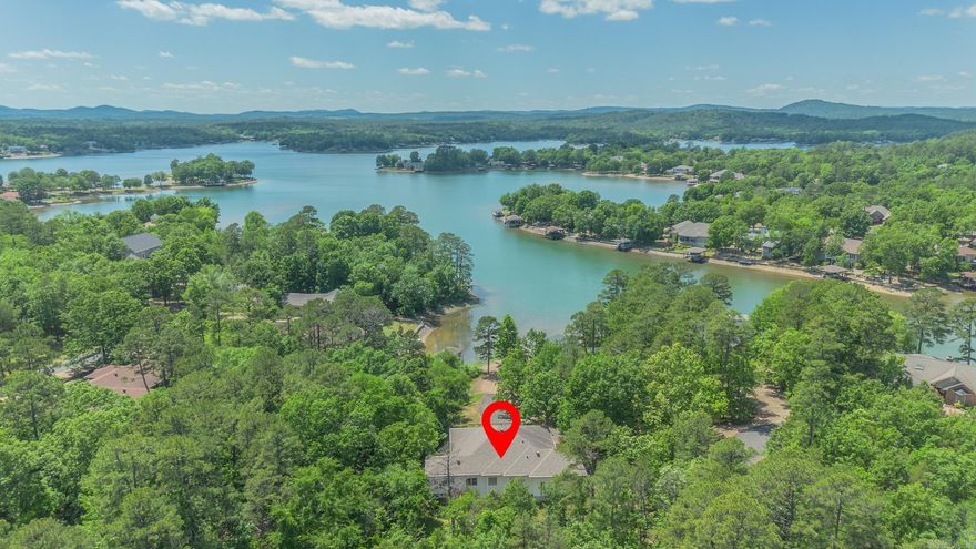 Common to Lake Balboa! Lake views from the Living areas and Kitchen. When you walk in, there is a living area to your right. Continue down the hall and there is a 2nd living area off the kitchen. Both living areas have a 2-sided fireplace. Formal dining room off the kitchen. Main level has Primary bedroom, sunroom and primary bathroom, Laundry room and half bath. Lower level has a living area, 2 bedrooms, 2 bathrooms and a sunroom/screened porch. Bonus is the Very Large Heated and Cooled Workshop! Ideal for many different Hobbies (wood working, train collector or quilting are just a few ideas). Bonus room that could be used as a 4th bedroom or Office. Back yard is partially fenced on either side of the sunroom. Recommend confirming the actual sq footage. New property owners to HSV will pay a One-time POA buy-in fee of $2,000. at closing. No Sellers Disclosure available.