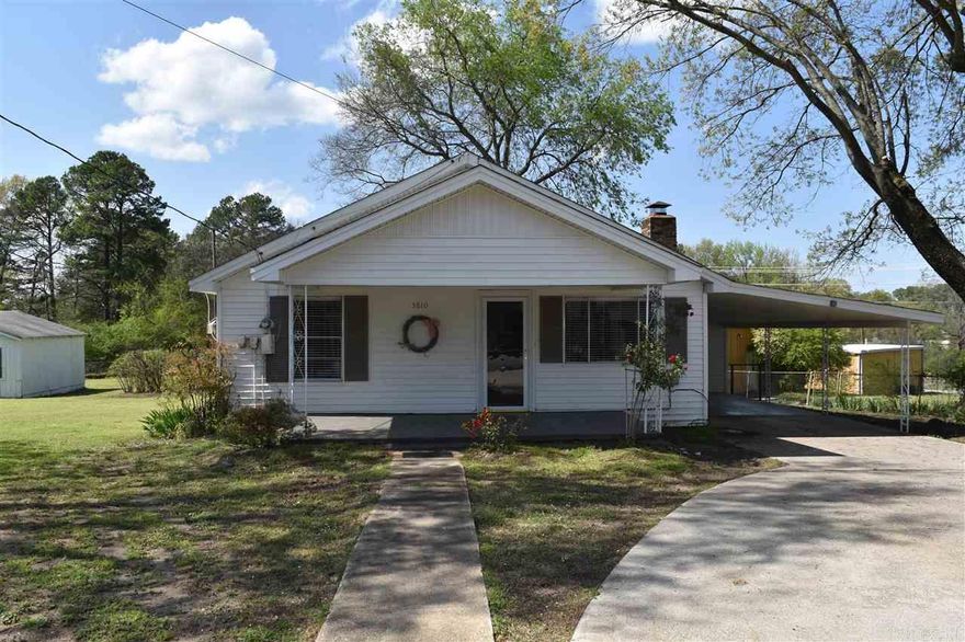 2 bedroom 1 bath home on .60 acre lot with storm cellar and shop. This house has been remodeled and is move-in ready. Open floorplan in living room, dining and kitchen. Woodburning fireplace in family room. Island in kitchen. New flooring and paint throughout. Partially fenced with shop in rear of house.
