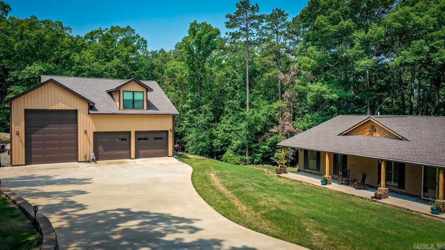 Listed below appraisal!!!!!LAKEFRONT!! Move in ready just bring your swimsuits and hit the lake. This one checks all the boxes. Home completely updated in 2018 and the detached garage was built in 2019. This beautiful 4 bedroom 3 bathroom with 2 primary suites has it all. Sunroom facing that beautiful lake view with covered deck on both sides. Main back deck has a hot tub to relax those tired muscles from playing on the lake too hard. 40x40 3 bay detached garage with 14ft doors on both ends that you can just pull that tower pontoon or RV through. Garage has it's own septic tank, water meter and power pole, separate from the main house. Above the garage is guest quarters w/full bathroom. Easy walk to the water. The list goes on and on. This home is calling you to make tons of memories so don't let this it pass you by. Call today because this beauty will not last long.