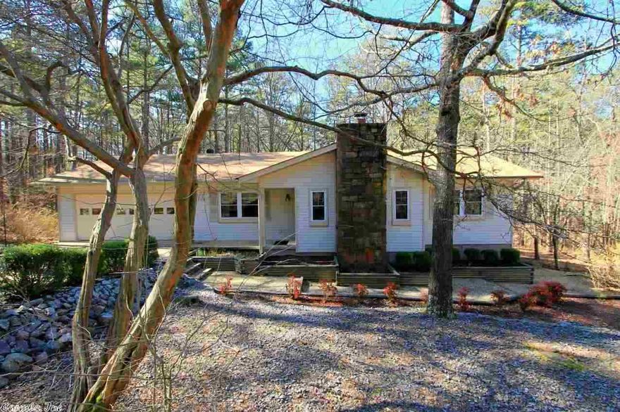 Just inside the west gate - this 2 bedroom home has a wonderful heated and cooled sun room and a bonus room that could function as a bedroom or craft room. Roof and hot water heater have been replaced - easy to clean double pane windows that tip in.  Beautiful landscape and a low maintenance yard. All this with a two car garage and a carpet allowance at this LOW PRICE!!