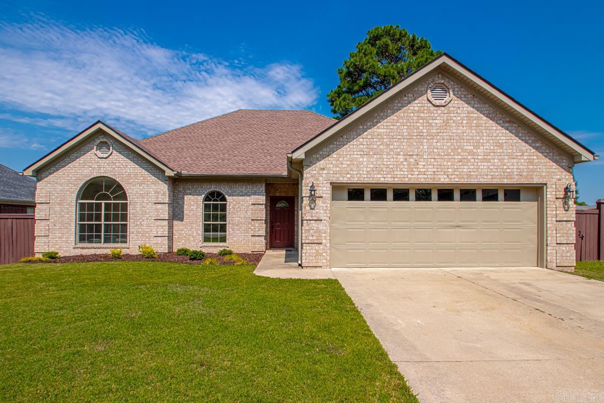 Beautifully updated home with lake views! Just one mile from the Indianhead Lake boat ramp, this move-in ready property offers easy access to kayaking, boating, and fishing. Enjoy a fully fenced, level backyard with a spacious deck overlooking the water. Recent updates include fresh interior/exterior paint, new LVP flooring and carpet (in bedrooms), and a completely remodeled kitchen with granite countertops, tile backsplash, pantry, and all new appliances. Bathrooms and the laundry room feature granite counters, updated lighting, toilets, and fixtures. A new roof, updated ceiling fans, and a gas log fireplace with a modern surround add even more value. The oversized primary suite includes an attached bonus room — perfect for a home office, gym, nursery, or craft space — plus a private bath with two walk-in closets. Conveniently located just 10 minutes from Little Rock Air Force Base and 12 minutes from downtown Little Rock. Don’t miss this refreshed lake-view home in a prime location — schedule your showing today! Some photos have been virtually staged to illustrate furniture placement and potential use of space.
