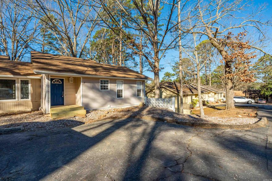 Well-located 3-bedroom, 2-bath townhome on the highly desirable west end, just minutes from Lake DeSoto, Westgate shopping, dining, and daily conveniences. Enjoy easy access to top community amenities including pickleball courts, walking trails, golf courses, lakes, and recreation areas, all nearby. This flexible townhome offers convenient entry from both upper and lower levels, making it ideal for full-time living, guests, or rental use. The functional layout provides generous living space, excellent storage throughout, and comfortable separation of bedrooms. Step outside to two private decks overlooking a peaceful wooded setting, perfect for relaxing, entertaining, or enjoying the natural surroundings. Low-maintenance living combined with a prime location makes this property an excellent option as a primary residence, vacation home, or income-producing rental. Whether you’re seeking a lock-and-leave getaway, a smart investment, or a comfortable home close to amenities, this townhome delivers value, versatility, and lifestyle in one of the most convenient areas of the community.