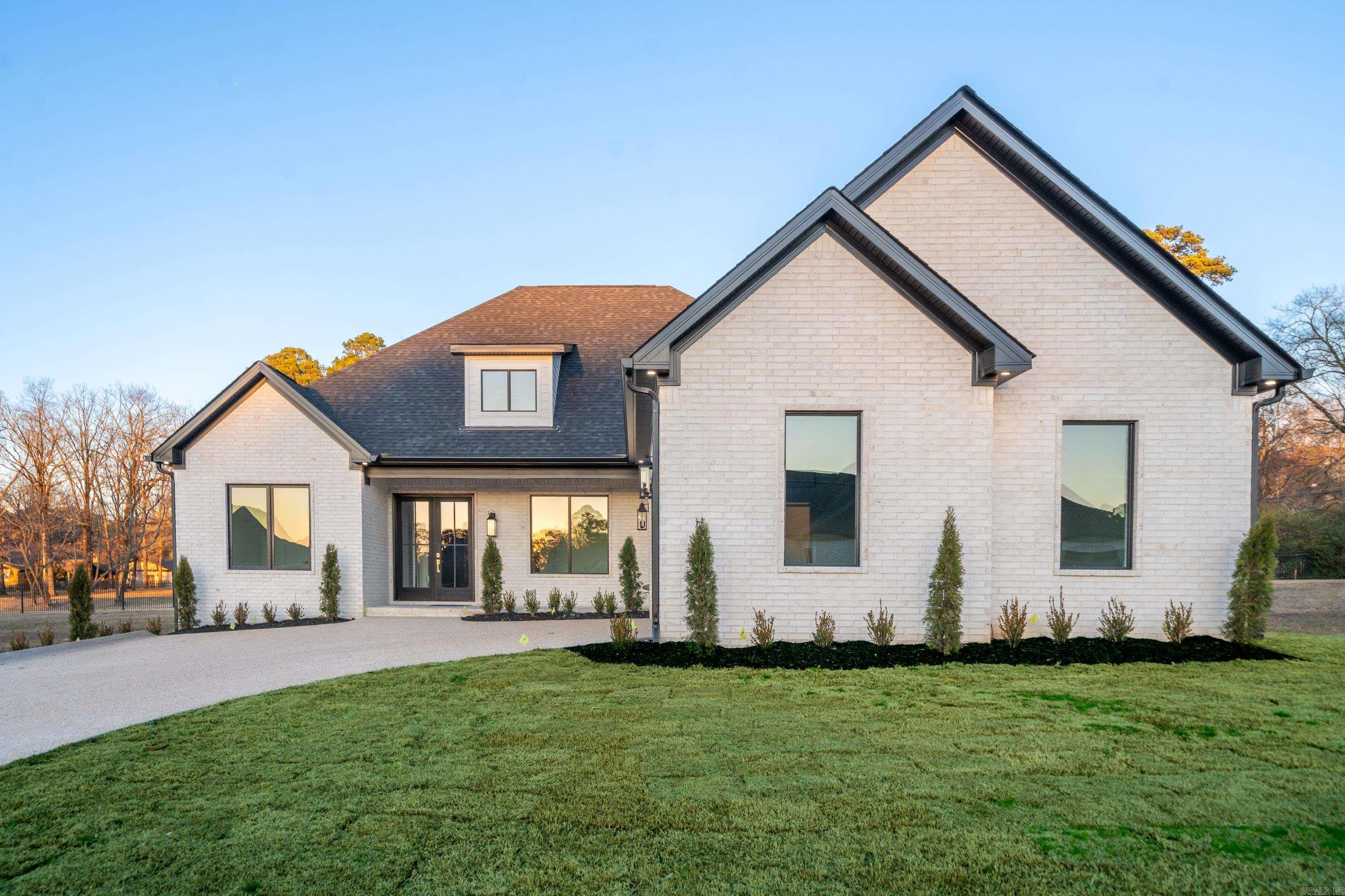 Discover modern elegance in this stunning 4-bedroom, 3-bathroom, 2,950 sq. ft. home in the highly sought-after Arlington Park Subdivision. Designed with exceptional attention to detail, this home offers an open-concept layout, ideal for both entertaining and everyday living. The spacious kitchen is a chefās dream, featuring high-end finishes, custom cabinetry, and a butlerās pantry for added convenience. Retreat to the luxurious primary ensuite, boasting a spa-like atmosphere with premium fixtures and ample storage. Custom touches throughout the home enhance its charm and sophistication. Enjoy the perks of a brand-new construction in a prestigious neighborhood, perfectly balancing comfort, style, and functionality. Donāt miss your chance to make this dream home your own!