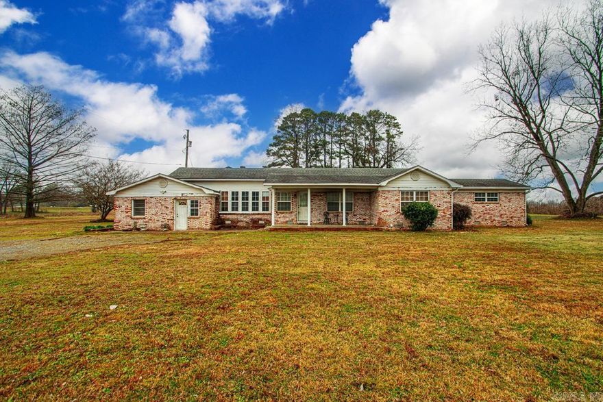 This cherished family-owned property, lovingly held for many generations, now awaits its next chapter on 2.94-acres. Built in 1950, this classic mid-century home offers timeless appeal and potential for personalization, ready for a new family to infuse it with their own vision and style. The main residence features 3 bedrooms and 3 bathrooms, providing ample space for comfortable living and entertaining. Mature landscaping enhances the grounds, highlighted by one majestic English walnut tree and seven soft-shell pecan trees. Complementing the main house is a detached two-car garage with an upstairs apartment, that needs updates.This rare opportunity combines peaceful acreage and established trees for those seeking a private, customizable homestead in a tranquil setting. The Seller had the home professionally appraised for the list price. Discover the possibilities and make this property truly yours. Schedule a showing today!