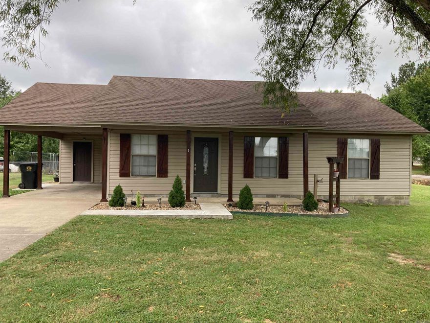 Welcoming 3 bedroom, 2 bathroom house on a large corner lot. Covered front porch perfect for relaxing and watching the sunset. Hard floors in the living room and kitchen, stainless steel appliances, separate laundry area, storage room off of the carport and a 10x12 storage shed/workspace with electricity! This house has so many updates and is ready to be your home today!