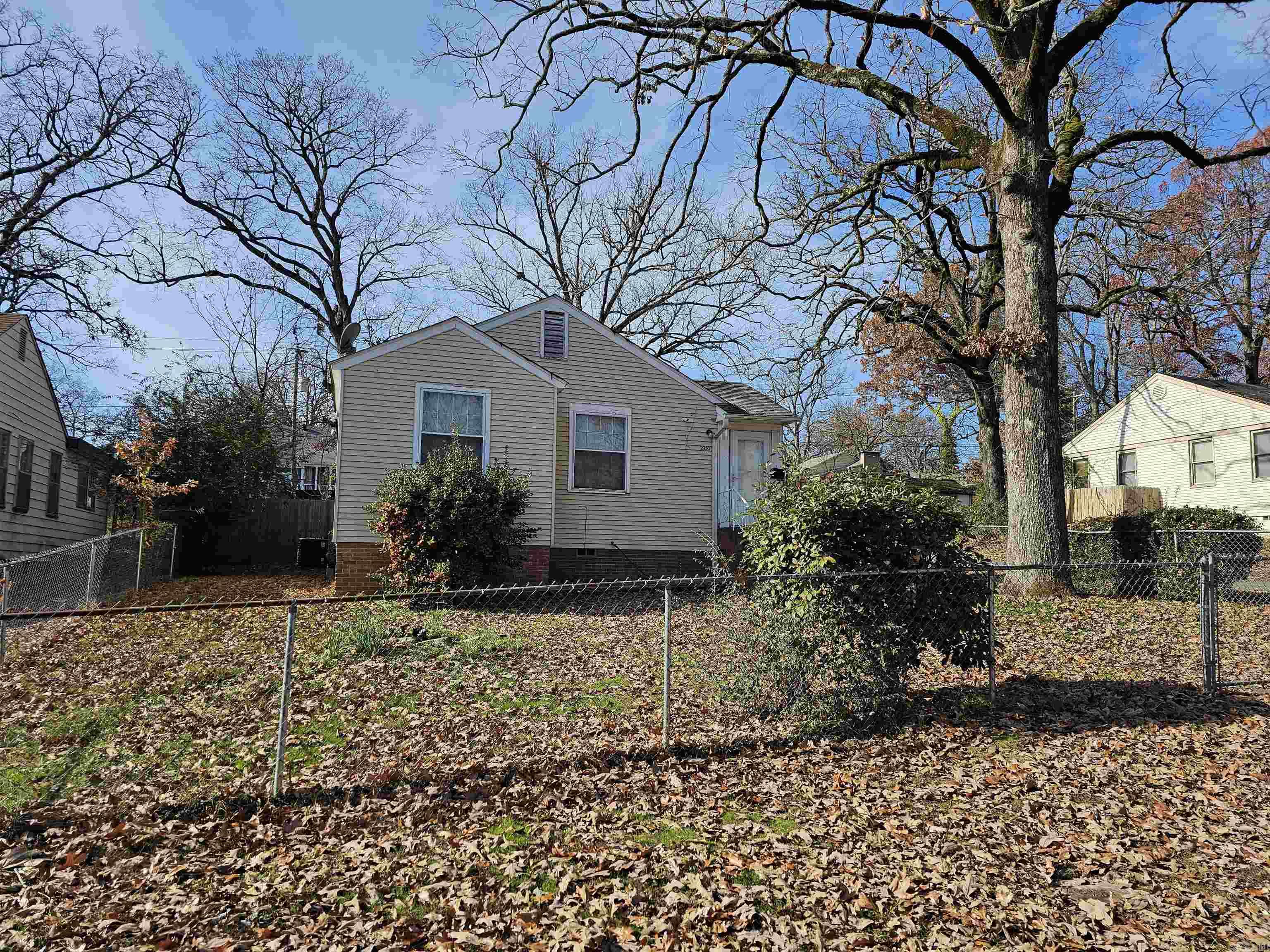 2 bedroom/1 bath home with lots of potential.  Home is on a nice large corner lot with a 2 car carport.