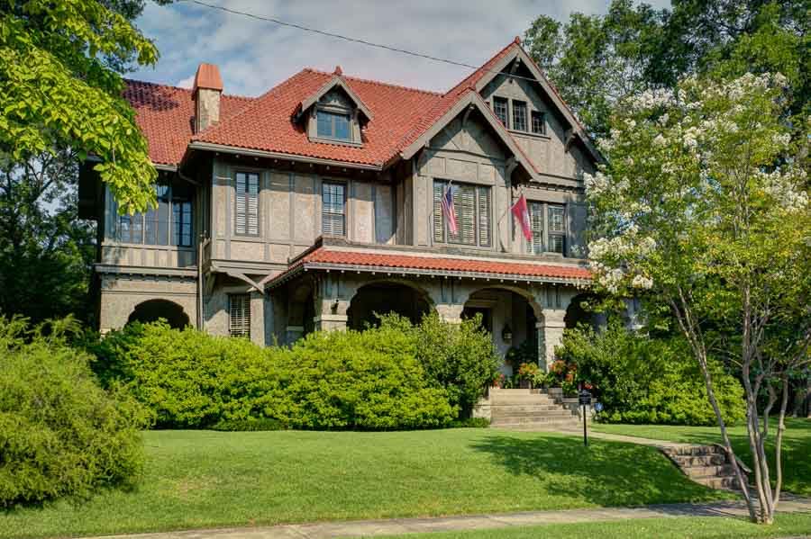 Listed on the Nat'l Register of Historic Places, the Turner Back House is distinguished by its blend of original architectural craftsmanship & modern livability. This light filled home features numerous living spaces, formal & casual dining rooms, study, butlers pantry & gourmet kitchen complete w/ large marble topped center island, gas cooktop, 2 ovens, & built in refrigerator. 14 ft ceilings. Master suite has sitting area & beautiful bath. Covered porches. 3 car garage. Shaded yd and immaculate gardens.