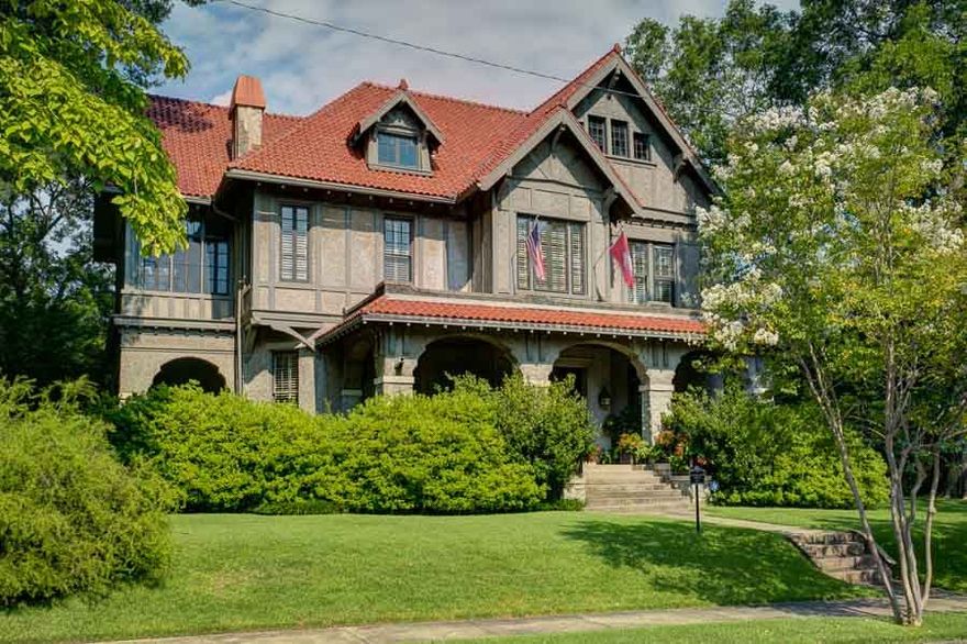 Listed on the Nat'l Register of Historic Places, the Turner Back House is distinguished by its blend of original architectural craftsmanship & modern livability. This light filled home features numerous living spaces, formal & casual dining rooms, study, butlers pantry & gourmet kitchen complete w/ large marble topped center island, gas cooktop, 2 ovens, & built in refrigerator.  14 ft ceilings. Master suite has sitting area & beautiful bath. Covered porches. 3 car garage. Shaded yd and immaculate gardens.