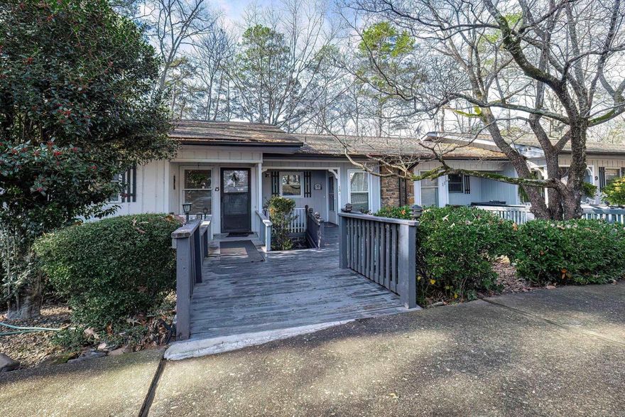 LAKEFRONT TOWNHOME, 2 bedroom, 2 bath on LAKE DESOTO WITH DOCK Updates include new slider and 2 windows, 6 can lights with dimmers, gutters and gutter guards, new walkway to dock, ceiling fans and lights. Water heater replaced in 2020.  Updated kitchen with soft close doors. Deck off living room has pullout awning and Deckrite flooring.