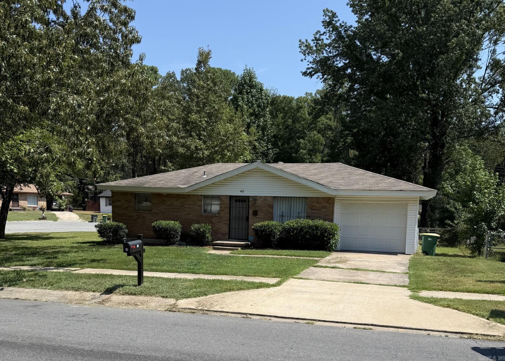 Nice corner lot with 3 bedrooms and one and a half baths, enclosed garage with laundry and storage. Great back yard with side access to culdesac. Security door at front. Has been great investment property with good history, tenants have moved out for owner occupied or new investor. Gas stove. Carpet, wood, and vinyl floors, updated baths. Nice grass and shade trees. Come check out a great opportunity.