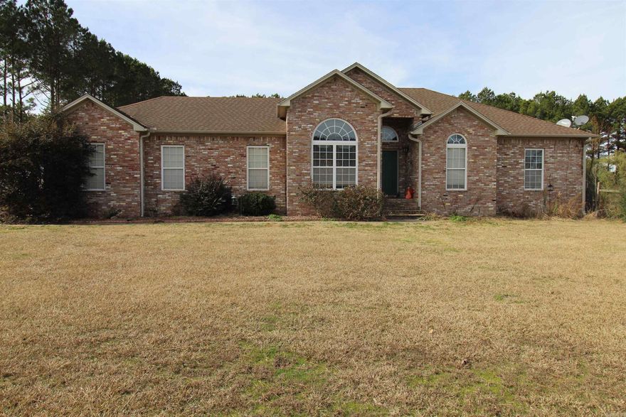 Beautiful 3 bedroom 2 bath house sitting on almost 4 acres. Fenced in yard with back deck area. 2 car garage, 14x36 shed with 16ft covered patio.  New water heater. New security cameras. Above ground pool in back yard.  5 minutes from town in the quiet and nice subdivision of Olivia Estates. Great place for horses. Call to see this one today.