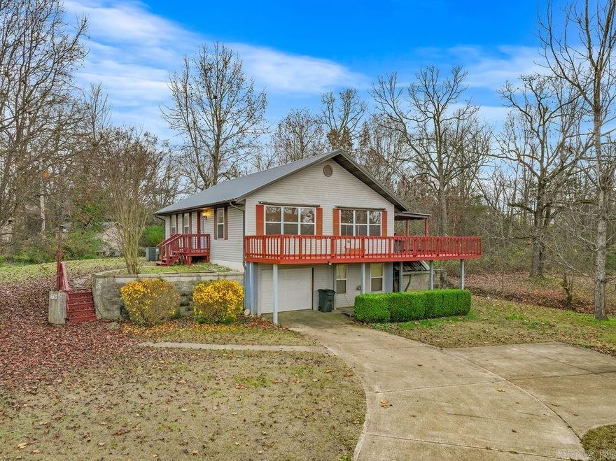 This one-owner residence offers 2 bedrooms and 1 full bathroom on the main level, along with a convenient laundry area, living room, and kitchen and dining area. Step outside the dining area onto the spacious deck, complete with a covered grilling area. The basement level provides flexibility, with a one-car garage, a family room/game room, an additional bathroom, an office, and an unfinished safe room/workshop ideal for storage, exercise space or future customization. Exterior features include peaceful views of a neighboring pond, off-street parking, and a low-maintenance metal roof.