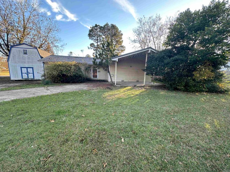 Situated on a corner lot, this property offers potential for outdoor living and landscaping possibilities.  Whether you envision a tranquil garden, play area for children, or a relaxing space for entertaining, the spacious yard provides a blank canvas for your imagination. Despite the need for updates, this home presents for a fantastic opportunity to customize and create the space that truly reflects your unique style and taste. Agents see Remarks This property has been placed in an upcoming online event. All bids should be submitted at www.xome.com/auctions  void where prohibited .