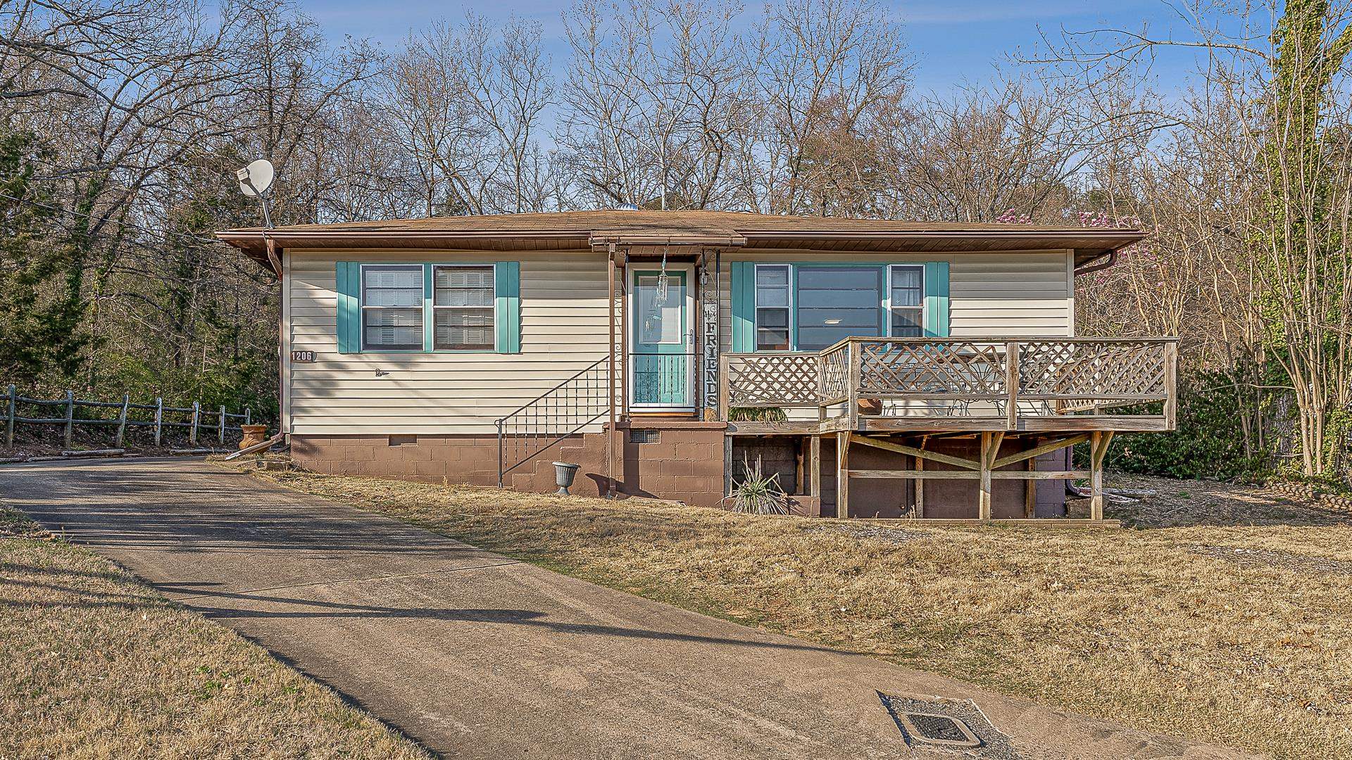 Watch the seasons change from your front deck in this adorable and spacious home in Heber Springs! Nestled in a prime location just off Main Street, this home offers both comfort and convenience, with easy access to Sandy Beach, Sugar Loaf Mountain, and the historic Gem Theater. Step inside to find beautiful natural hardwood floors throughout. The main living area features two bedrooms, a full bathroom, an updated kitchen, and a large living space filled with natural light from oversized windows. A private second living quarters boasts its own cozy living area, a bedroom, and a beautifully updated cabin-style bathroom—perfect for a private master suite, in-law quarters, or a potential vacation rental. The private backyard offers a peaceful retreat, while the huge walk-in basement provides ample storage or the opportunity to create additional living space. Don’t miss this unique opportunity to own a home with character, versatility, and breathtaking views! Schedule your showing today.