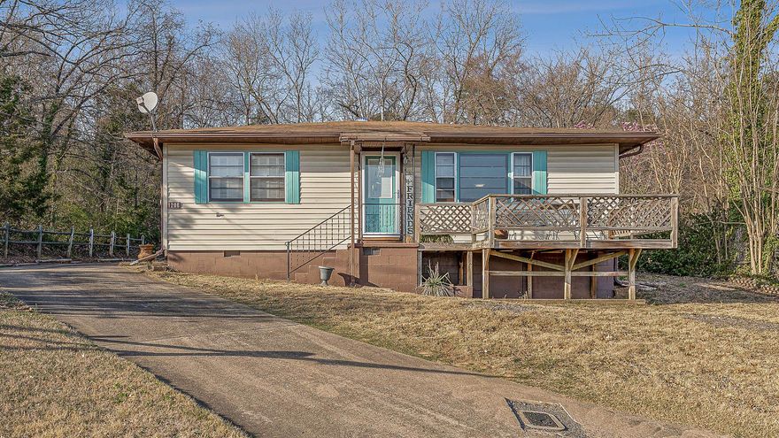Watch the seasons change from your front deck in this adorable and spacious home in Heber Springs! Nestled in a prime location just off Main Street, this home offers both comfort and convenience, with easy access to Sandy Beach, Sugar Loaf Mountain, and the historic Gem Theater.  Step inside to find beautiful natural hardwood floors throughout. The main living area features two bedrooms, a full bathroom, an updated kitchen, and a large living space filled with natural light from oversized windows. A private second living quarters boasts its own cozy living area, a bedroom, and a beautifully updated cabin-style bathroom—perfect for a private master suite, in-law quarters, or a potential vacation rental.  The private backyard offers a peaceful retreat, while the huge walk-in basement provides ample storage or the opportunity to create additional living space.  Don’t miss this unique opportunity to own a home with character, versatility, and breathtaking views! Schedule your showing today.