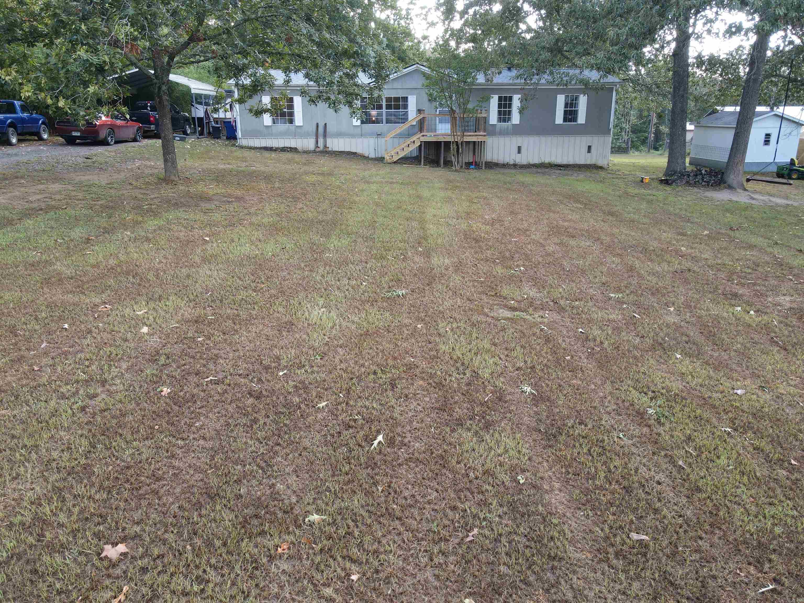 Well maintained Double Wide on a permanent foundation featuring 3 bedrooms, 2 bathrooms, and additional versatile rooms ideal for extra bedrooms or a home office. Situated on 1.91 acres, this property offers both space and flexibility! New HVAC 2023, NEW Roof July 2025!