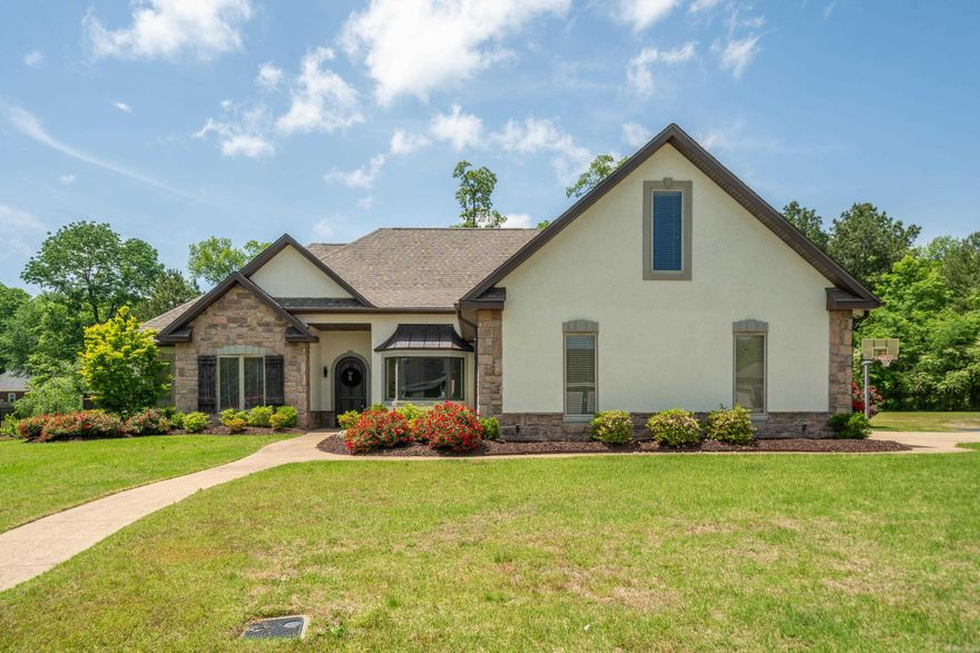 Welcome to this stunning 5-bedrooms, 3.5-bath home located in one of Hot Springs' most desirable gated neighborhoods near Lake Hamilton. Thoughtfully designed with an open- concept floor plan, this home offers the perfect blend of spacious living and modern comfort. Step inside to find a chef's kitchen that will impress all. Featuring top- tier appliances, custom cabinetry, and ample counter space ideal for entertaining. the seamless flow into the living and dining areas creates a warm and inviting space for family and guests. Escape to the primary suite that features two walk in closets and patio access into the beautiful backyard.  Upstairs, you'll find a generous bonus room and a dedicated playroom- perfect for a home theater, hobby space, or children's retreat.  Enjoy exclusive neighborhood amenities including private boat ramp, boat storage area, lakeside pavilion with BBQ grill, perfect for fun weekend getaways without ever leaving home. Whether you're looking for a permanent residence or a luxurious lake retreat, this home offers a rare opportunity to enjoy the best of Lake Hamilton living.