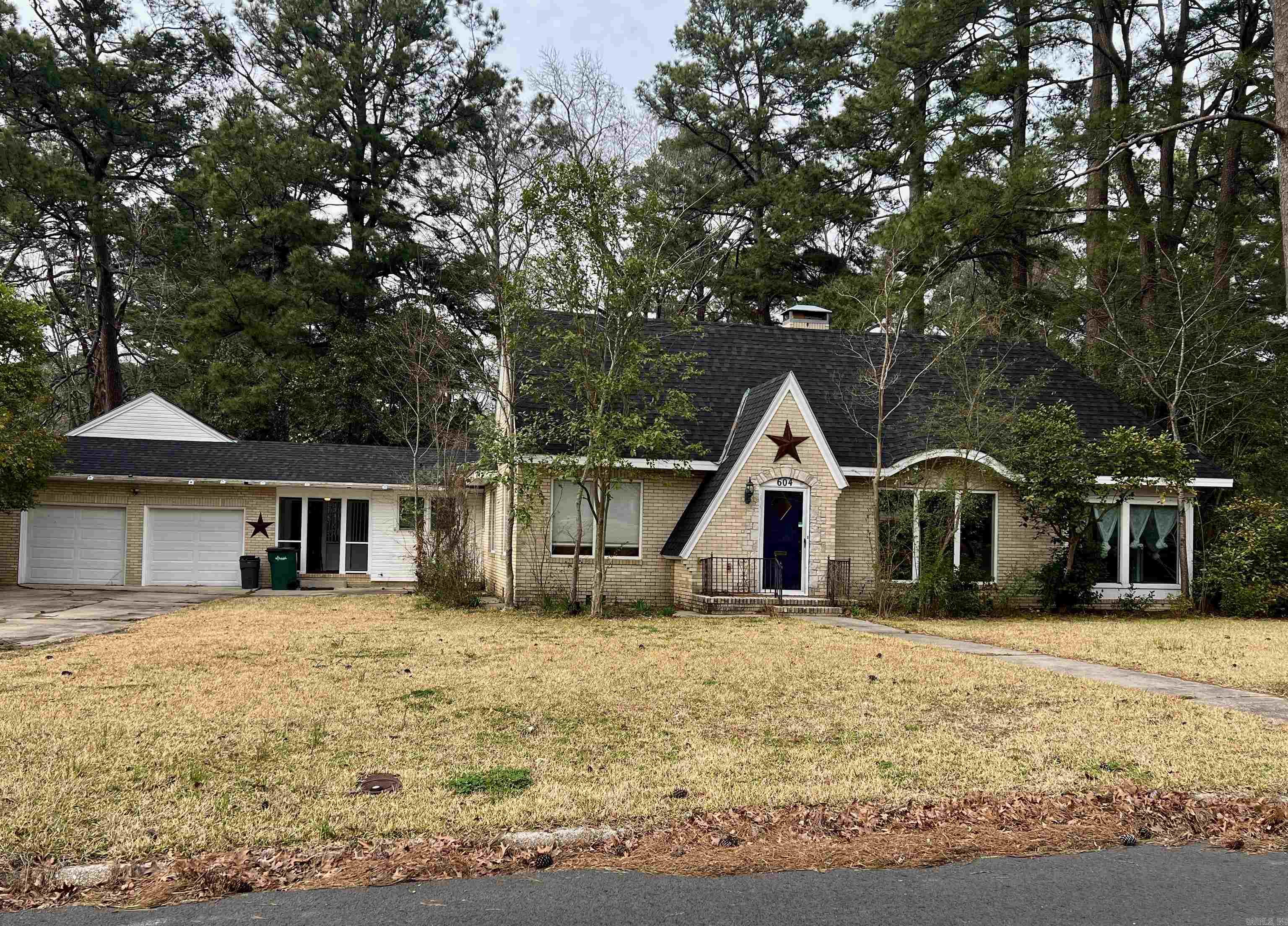 This custom-built, charming vintage home is in a prime location near work, dining, parks and entertainment. Features a formal living room, dining room, and glassed-in sunroom where you can sit and enjoy a beautiful sunny, or relaxing rainy day. The kitchen has a pantry, wood cabinets and dumbwaiter. The versatile basement can create a 4th BR, or 2nd living space, with its own entrance and bath including a walk-in shower and walk-in closet. You will enjoy this beautiful home and its timeless character with modern convenience.