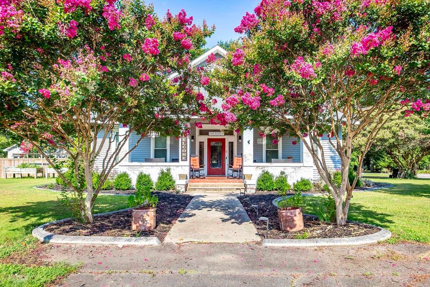 Step into a home that exudes warmth and character! The front yard, adorned with lovely landscaping and two elegant trees, guides you to a welcoming covered front porch. Inside the foyer, enjoy the tall ceilings, natural hardwood that flows throughout, and exposed shiplap walls. To your right, the den features a cozy wood burning fireplace and a piano that stays with the home, leading into the formal dining area. Across the hall, two inviting bedrooms have their own wood-burning fireplaces. As you walk down the hall, the formal living area awaits with yet another wood-burning fireplace, built ins, and large windows offering ample natural light. At the back, the kitchen showcases stainless steel appliances, white cabinets, bar seating, and a dining area with access to the garage and fenced back yard, complete with a large shop, fire pit, and metal pool. The main floor also offers a full bathroom and laundry area. Upstairs, discover three more bedrooms, a charming bathroom with a claw foot tub, and an office space. This home, is filled with character and is waiting just for you to make it yours! $10,000 towards upgrades of buyers choosing!