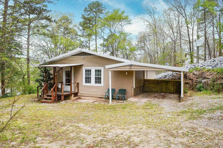 Secluded Lake Catherine home. Want to be close to the city but without all of the noise? This property is just for you! Recently remodeled 2 bedroom 2 bath home with a covered boat dock. New HVAC 2025. This would be the perfect lake retreat home or it could be a great investment property.  Refrigerator, washer and dryer convey. Be sure to reach out for your VIP showing!! AGENTS PLEASE SEE REMARKS.