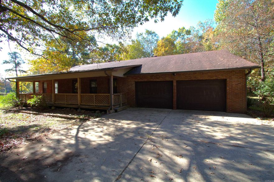 TAKE A LOOK AT THIS AFFORDABLE HOME WITH ACREAGE IN PULASKI COUNTY.  Country Living just outside of Town! 3 acres, with a shop! This place has it all. Two living spaces, Huge patio and deck area for the outside entertainment! Property adjoins a pond for you to enjoy fishing and wilderness! Extra room off the back would be perfect for multi uses. Shop has 3 bay doors, power and heated! Water was run but never hooked up. Roof 2015. Appliances and water heater about 5 years old. City water and natural gas. Septic. Come get your slice of country living Minutes from the freeway! SELLER OFFERING $5,000 TOWARDS CLOSING COSTS OR LOAN BUYDOWN. Come see the beauty and country right outside of town.