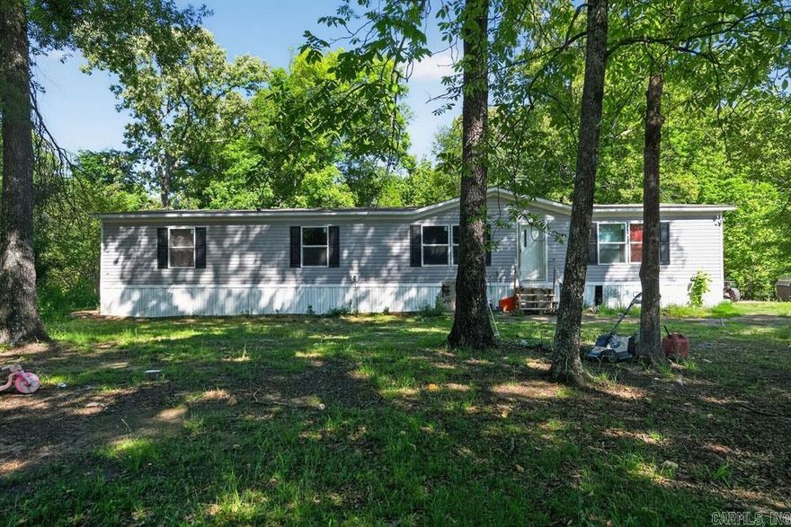 Like New 2024 Double Wide Manufactured Home.  Located on 3 acres in El Paso AR about 5 miles East of Vilonia 8 miles West of Beebe.  This home is in immaculate condition and is setting on 3 acres with total privacy.  If you need a lovely home with some elbow room between you and the next door neigbors, then this is the home for you.  It has 4 bedrooms and 2 baths with an open floorplan.  The sale includes the stove, dishwasher, refrigerator, washer and dryer. Plus, there is a storm cellar on the property for additional safety during stormy weather.  This home qualifies for a Rural Development Loan with zero dollars down. It is on a well and septic system.  Call to schedule a tour today.  Don't delay.
