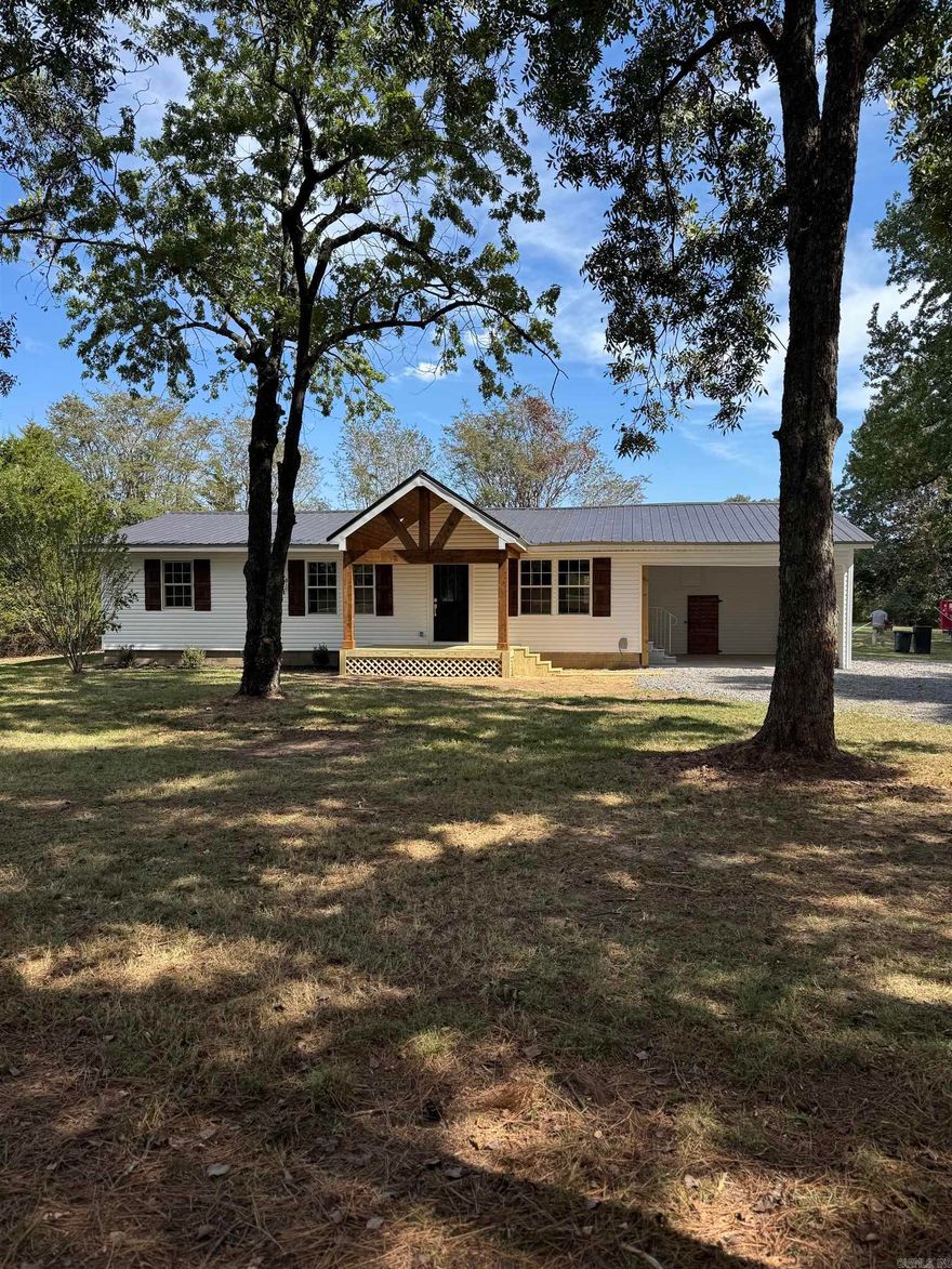 This 3bd/2ba completely remodel home sits on two acres. Inside the home offers new flooring, kitchen cabinet and fixtures, stainless steel appliances, update bathrooms and fixtures, hot water heater and electrical. The exterior offers new roof, siding, front porch and an extended driveway. The new back deck offers plenty of room for outdoor entertaining or a place to sit and enjoy the peacefulness of this property. This is a must see.
