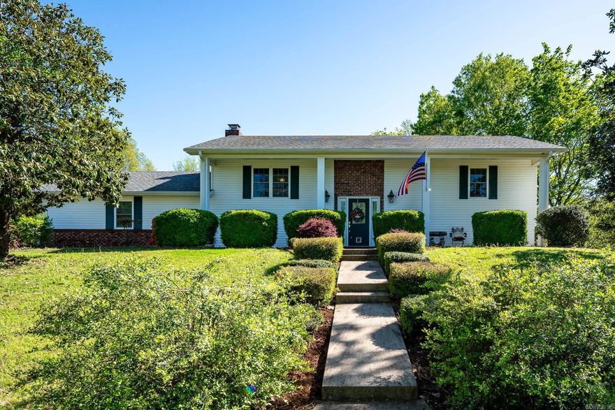 Step into a world of charm and tranquility with this colonial-style home, within the city limits of Conway. Set on a 1.5-acre lot, with Conway Corp utilities, this property is a rare find. The home boasts 4 spacious bedrooms and 3 bathrooms, perfect for a growing family or hosting guests. The split-level design offers two distinct living areas, the kitchen has granite countertops for that touch of elegance. But the true beauty of this property lies in its breathtaking outdoors. You will enjoy exploring the property adorned with roses, fruit trees, and a vineyard boasting grapes. For the green thumbs and home chefs, you'll be delighted with the blueberries, strawberries, asparagus, and array of herbs growing right in your backyard. The property also includes a chicken coop with laying hens for fresh eggs daily, and a serene pond filled with goldfish. This home is more than just a place to live- its a lifestyle. Don't miss out on this opportunity to own a piece of paradise in Conway. Schedule a viewing today!