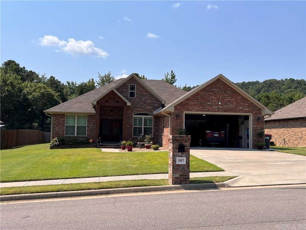 Welcome to this beautifully crafted custom-built home offering modern comfort and eco-friendly living! This 3-bed, 2-bath home, built in 2020, features open floor plan, plantation shutters, granite countertops, a dining area, pantry, and a large laundry room. The primary suite includes a spacious walk-in closet and a sleek walk-in shower. Outside, enjoy a custom back patio with a remote-control blower to keep bugs away, and a 10x16 shed perfect for a workshop or extra storage. Energy-saving solar panels provide long-term savings. Buyer must assume the solar loan at closing and contact the lender within 7 business days of an accepted offer for pre-approval. Located near downtown Russellville with easy access to trails, shopping, and schools, this home offers the perfect blend of comfort, convenience, and sustainability.