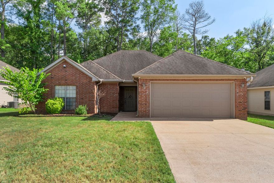 BUYER INCENTIVE 5k!!! Step inside this charming 3-bedroom, 2-bath home and fall in love with its open floor plan—perfect for everyday living and entertaining. The living room welcomes you with a cozy fireplace, creating the ideal spot to gather with family and friends. The spacious primary suite features an en-suite with a walk-in shower, jetted tub, and dual closets for plenty of storage. Outside, a covered deck overlooks the fully fenced backyard, offering a private space for relaxing, playing, or hosting guests. An attached garage adds convenience and extra storage, making this home as functional as it is inviting.