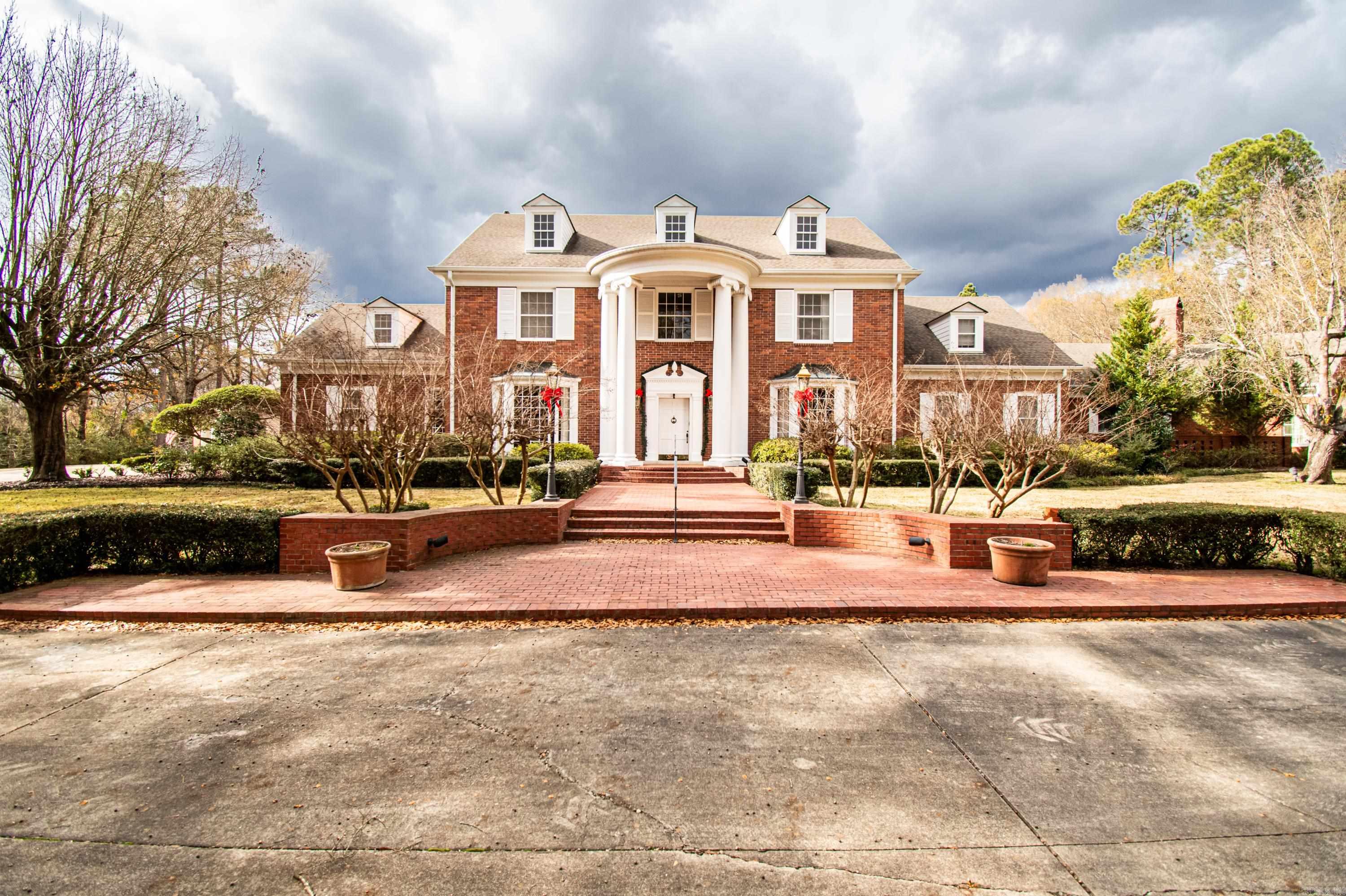 Captivating 5 bedroom, 7 full/2.5 half bath estate on 4.7 acres! Approximately 8,810 square feet featuring a fully fenced back yard, 3 car carport, outdoor fireplace, large covered back porch, and a circle drive. This stately residence is ready for its new family!