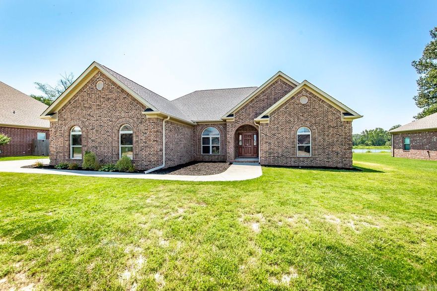 Magnificent home in a terrific neighborhood nestled just minutes from the city of Cabot, a five minute drive to Cabot schools & easy access to 1-67!This beautiful 4-bed, 2-bath home has split floor plan home with hardwood floors.  You will love the built in cabinets, closets and crown molding.   Home has formal dining room that could be used as an office or flex space. Soaring ceilings, spacious layout for entertaining guests, peaceful backyard w/a pond view allowing for evening sunsets and a country feel.  Upgraded stainless appliances, granite tile counters, move in-ready so do not miss seeing this home.  Call today!