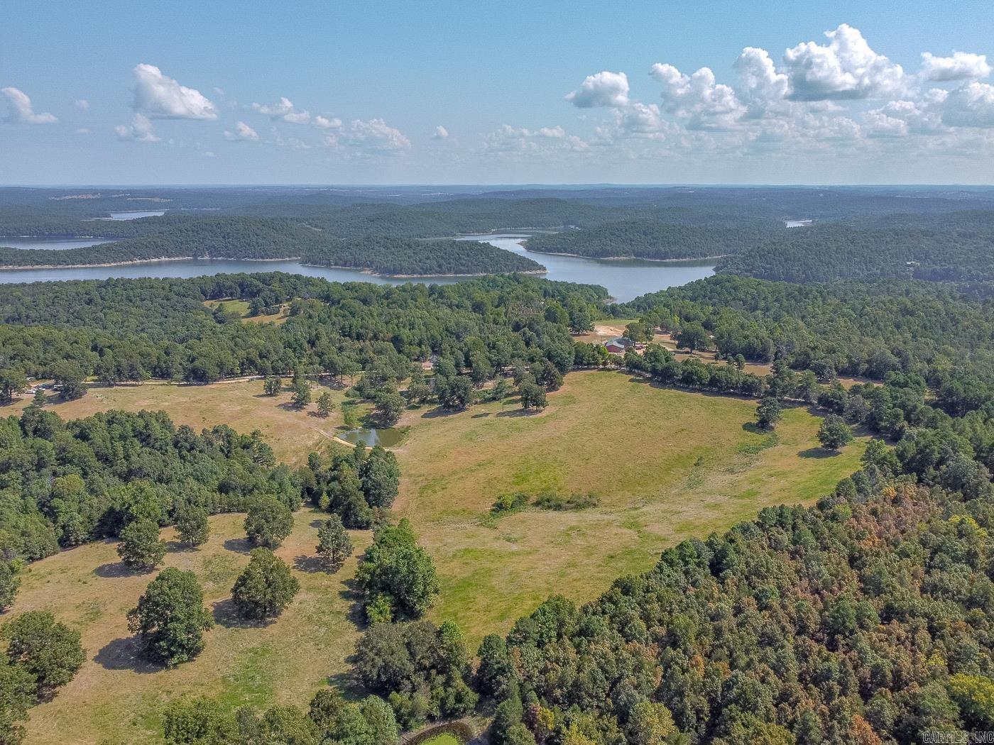Welcome to Market 36.26 +/- acres on County Road 66 in Calico Rock, Arkansas. This vacant land is ready for its new owner to make it their own. Sitting close to Lake Norfork, this could be your next retreat, cattle farm or so much more. This property features a large pond and pasture ground as well as timber for shade. The seller loves the deer and turkey hunting. Call today to see this one before itās gone!!