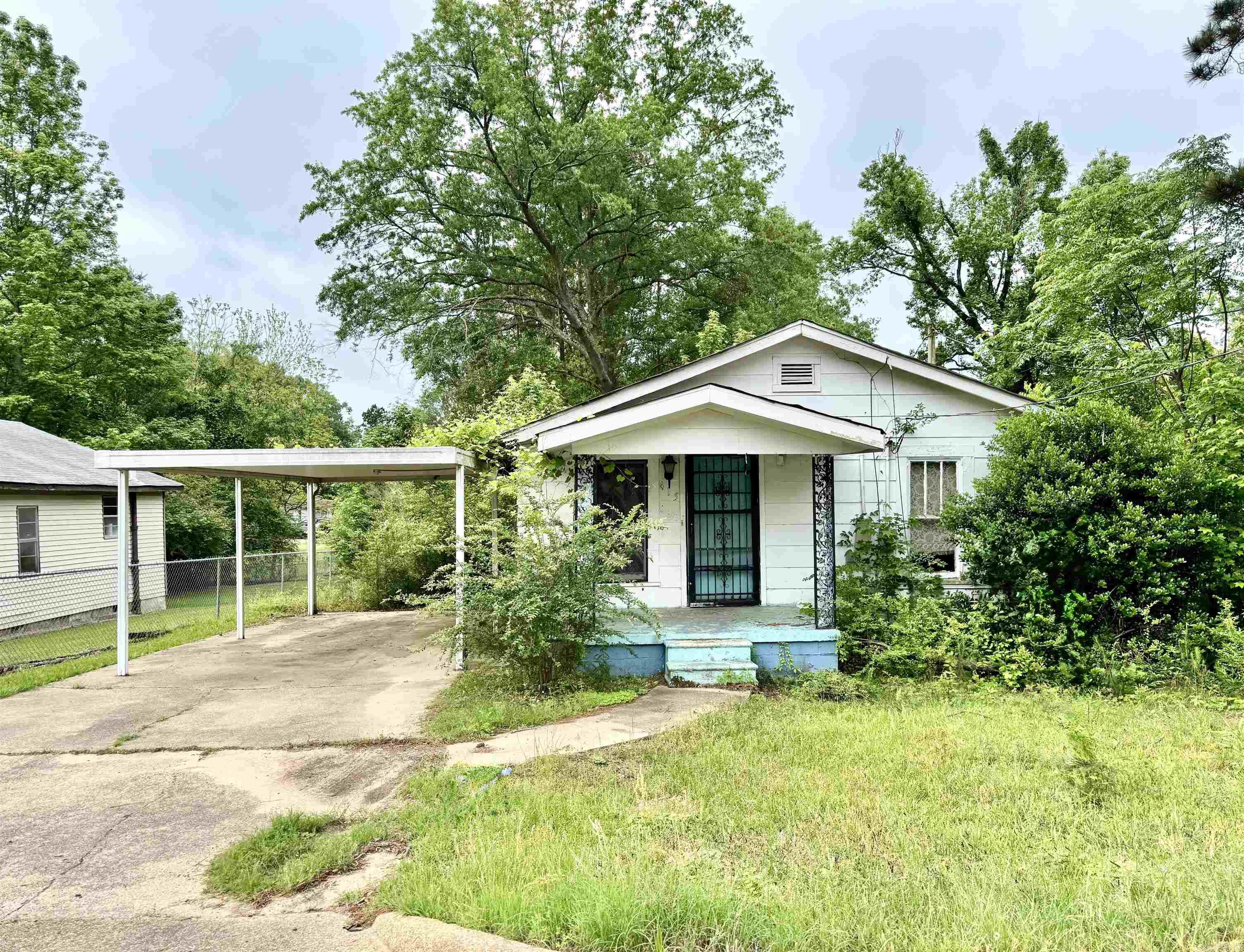 Investor Special - 2 Lots in Sunny Park Subdivision! Attention investors! This as-is, where-is property presents a great opportunity to own two spacious lots in the Sunny Park subdivision. Whether you're looking to restore the existing home or start fresh with new construction, this property has great potential! Located less than half a mile from shopping and dining--including Walmart, Domino's, and McDonald's--this location offers convenience and accessibility that's hard to beat. With plenty of room to build and grow, this property could be the site of your next successful flip, rental, or custom build. Don't miss this chance to invest in an area with strong rental demand and redevelopment potential.