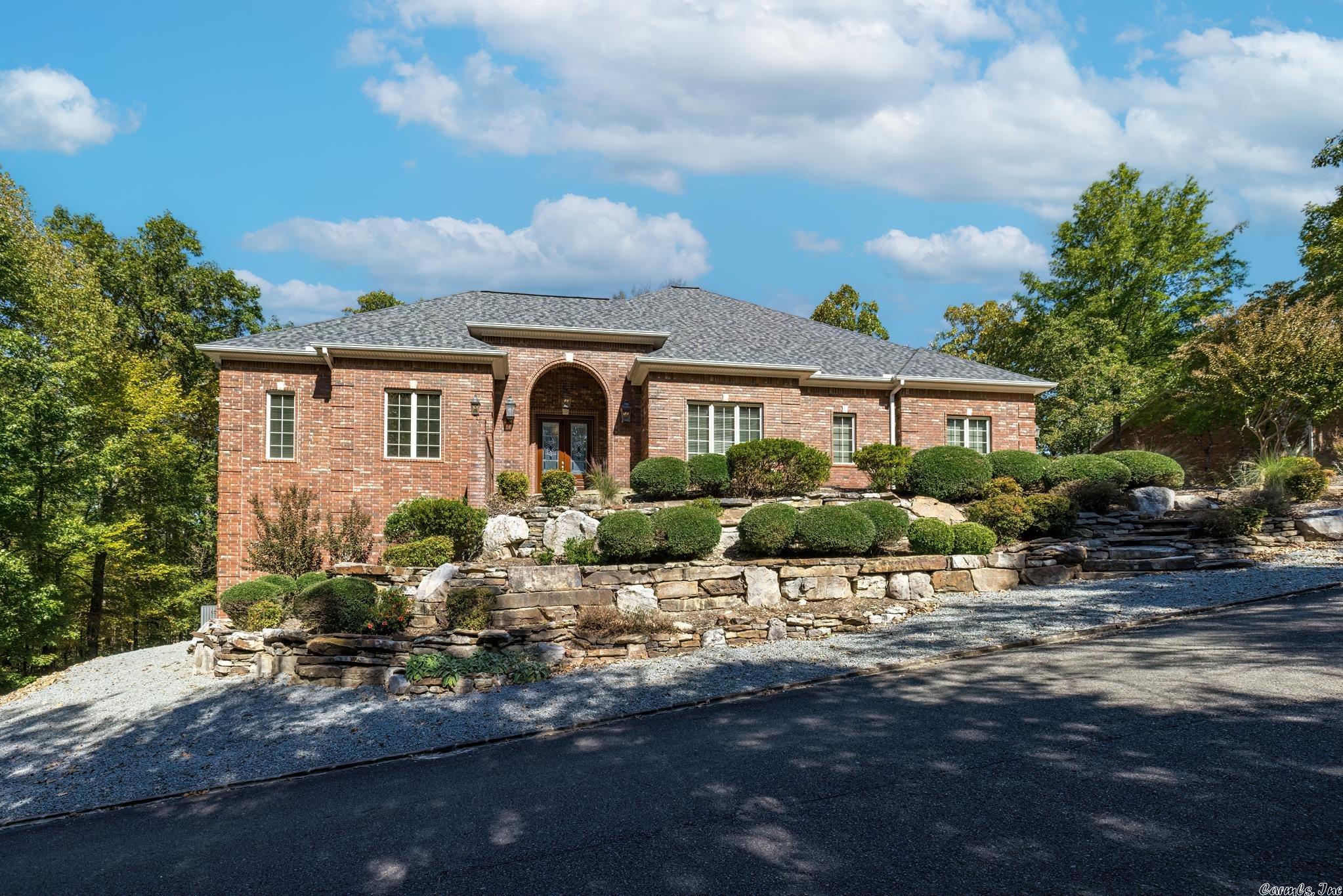 4 bed. 5 bath. 3 large separate garages w storage.  Kitchen w hearth room & fireplace.  FDR w built in china cabinet & buffet.  gas cooktop. double ovens w convection.  wet bar w sink & ice machine.  6 TVs incl theatre room w 4 theatre chairs.  3 refrigerators convey, incl 171-bottle wine bottle beverage fridge.  washer & dryer convey.  office w wall of cabinets.  desk & file cabinets convey. elevator shaft. ADA handicap accessible. Massive amount of storage.   Large workshop w dust collection vacuum system.  4978 +1091 = 6069 sf w HVAC. SF estimate. Everything under roof has HVAC except garages.  Buried propane tank.  irrigation.  Experience Diamante living at its finest.   Custom-built Ben White home.   Ideally situated on Diamante #8 fairway.   Wooded lot on west side of property.  HSV's only private subdivision and country club living.   DIAMANTE - Live the Good Life.  Diamante subdivision & country club is home to Golf Digest #3 ranked AR golf course.   Club amenities include world class tennis & pickleball, a private swimming pool & a wide array of dining & social events & activities.   Property owners receive 3 free rounds of golf each month for family and friends.