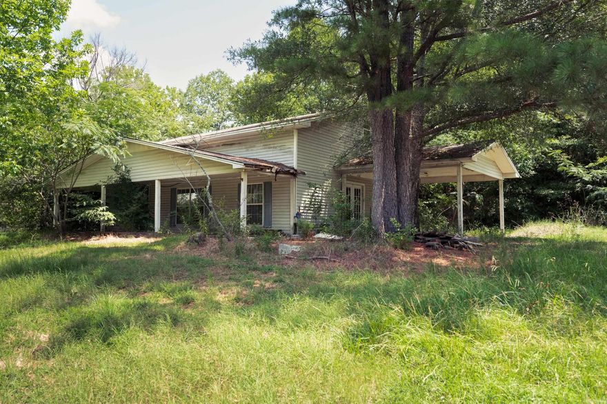 This investment property presents an excellent opportunity for renovation enthusiasts and developers. With 4.22 acres of land, the property offers ample space for various projects and improvements. The interior has already been gutted, providing a blank canvas ready for your creative vision to transform it into a beautiful living space or income-generating property.  The property includes a spacious shop, perfect for storage, a workshop, or any other use you may envision. The shop's size and versatility make it a valuable addition to the overall potential of the property.  Whether you're looking to renovate and resell, rent out, or create your dream home, this property provides the perfect starting point. Take advantage of the existing structure and the generous acreage to realize your vision and capitalize on this unique opportunity. SEE AGENT REMARKS!!!