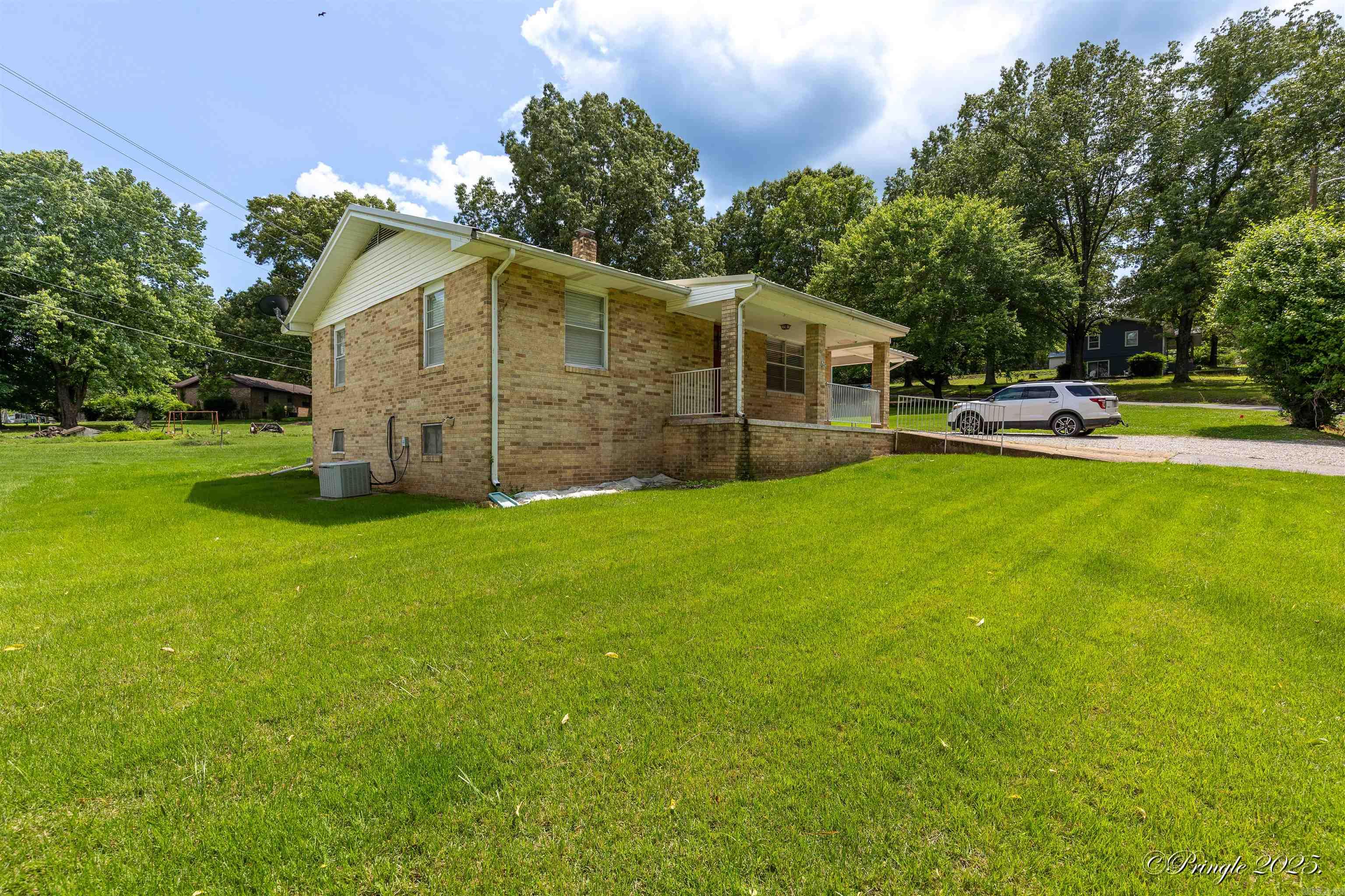 Beautiful freshley remodeled brick home with a half basement just a stones throw from Spring River public fishing access, nicely landscaped with a view of Spring River from your front porch, this one has so many options , full time home, weekend get away or an income producing investment , lets take a look !!!!!!!!!