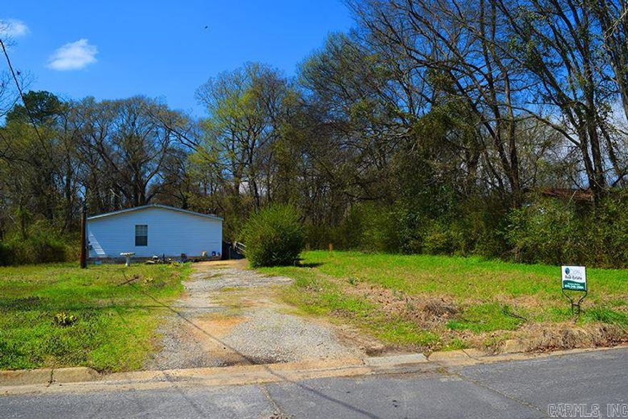 Searching for an improved lot in Arkadelphia.  Mobile home is not owned by the seller and is set to be moved by tenant.  Zoned R3 which is the most relaxed zoning in Arkadelphia.