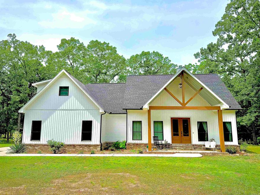 Looking for space to spread out without sacrificing comfort? This 4-bedroom, 3-bath home, built in 2022, sits on 3 peaceful acres just outside the city limits and offers the perfect balance of privacy and convenience—plus it’s located in the highly desirable Cabot School District.  Inside, the open floorplan makes everyday living feel effortless, with a spacious kitchen featuring leathered granite countertops that flows right into the main living area. The bedrooms are generously sized, all with walk-in closets, so no one has to fight for storage space.  The primary suite is a relaxing retreat, complete with a beautiful en suite and a large walk-in shower that might make you linger a little longer in the mornings.  Step out back and you’ll find a huge covered porch with a fireplace—perfect for quiet evenings or hosting friends—overlooking a tree-lined property that gives you room to breathe.  Comfortable, inviting, and just the right amount of tucked away—this one feels like home the moment you arrive.   SEE AGENT REMARKS