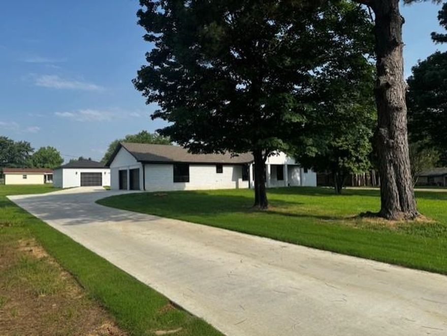 Just minutes from ASU and NEA Baptist Hospital, this fully renovated home in Nettleton School District! Sitting on a 1.03 acre lot, this all-brick home (freshly painted white with new dark siding) offers over 3,500 sq ft of living space, including a 900 sqf. basement.  The main level features 4 bedrooms and 3 full bathrooms, including a generous master suite, two living areas, and a large kitchen with new appliances and wood cabinets. The finished basement adds approximately 900 sq ft with 3 rooms and another full bath perfect for a home office, guest space, or extra storage. One of the basement rooms has been converted into a storm shelter with a reinforced steel multi-lock door for added peace of mind. A A brand-new 20' x 30' brick workshop has been added to match the home, and adds incredible value and utility. Major upgrades include a new roof, HVAC system, appliances, sheetrock electrical plumbing. Estimated completion date is July 1 don't miss your chance to own this beautifully reimagined home in a prime location!