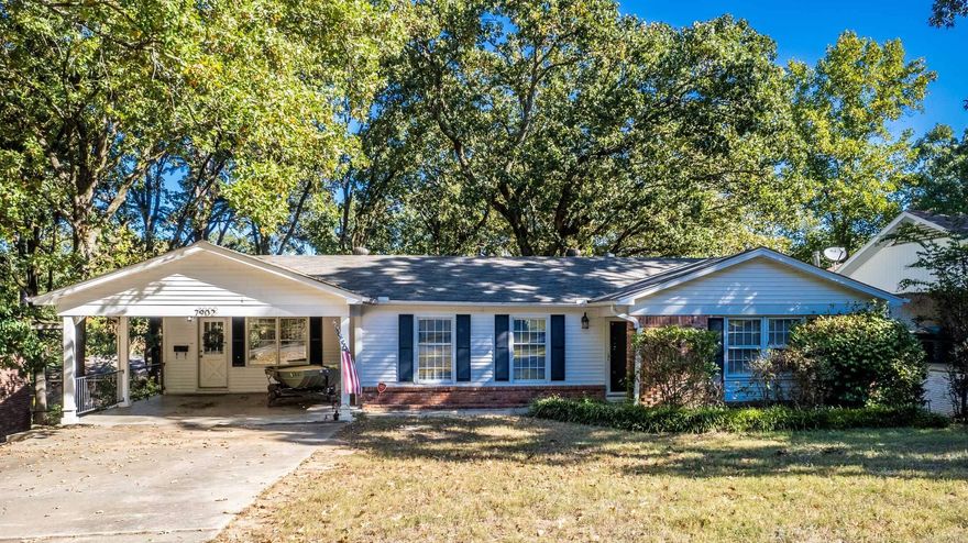 Charming Midtown home with lots of space.  Main level features 3 bedrooms, 2 baths, dining, living kitchen and sunroom.  Downstairs features a large bonus area with wet bar. 4th bedroom and bath.  Large backyard, 2 car carport.