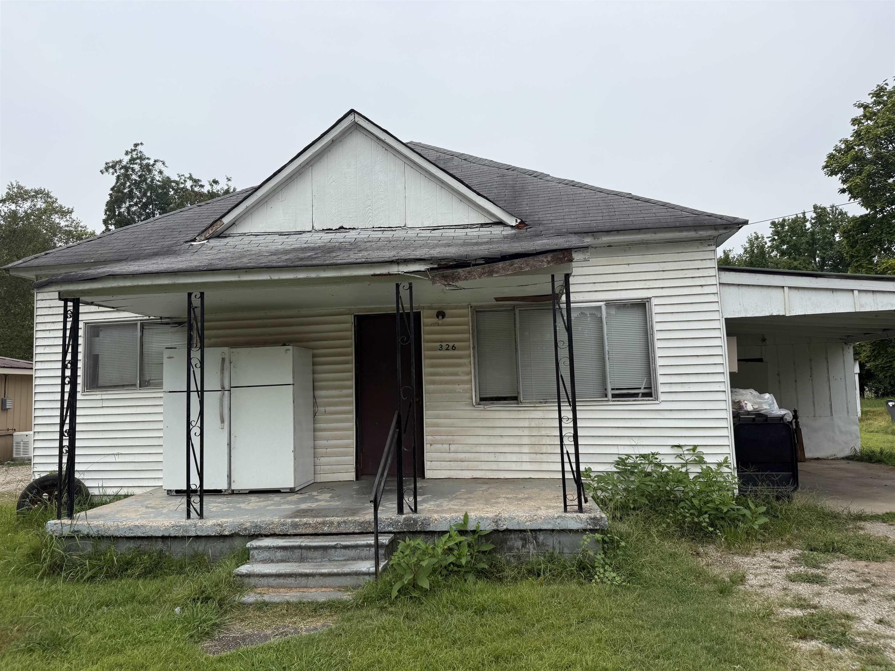 Investor special! 3 bedroom, 2 bath home needs some TLC. This lot had an additional house at one time, but it has been removed. It's possible to build another in its spot and have two houses on this lot.