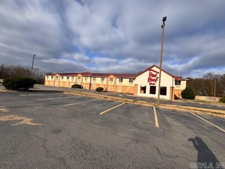 Don’t miss this rare chance to own a well-positioned 52-unit hotel in the heart of North Little Rock. This property offers strong visibility, convenient access to major highways, and close proximity to restaurants, retail, and local attractions. This hotel is ideal for investors seeking a value-add opportunity or operators looking to expand their portfolio. With its great price, solid structure, and high-demand location, this property is perfectly suited for renovation. Whether you’re a seasoned investor or new to hospitality, this is an excellent opportunity to capture long-term income potential in a growing market. Hotel assets in this price range rarely hit the market in North Little Rock.