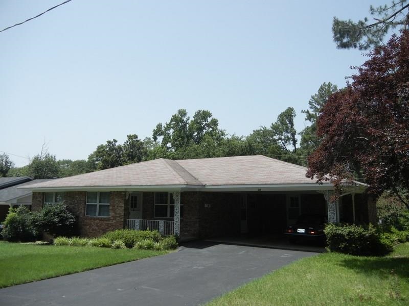 Beautiful one level brick. Immaculate condition original hardwoods appear new. New paint. New appliances, some stainless steel. New disposal. HVAC less than 5 years. Tile in baths. Tile counter top. Tile walk-in shower. Large fenced backyard. Quiet location. Inside laundry. Extra storage. Double carport. Close to shopping.