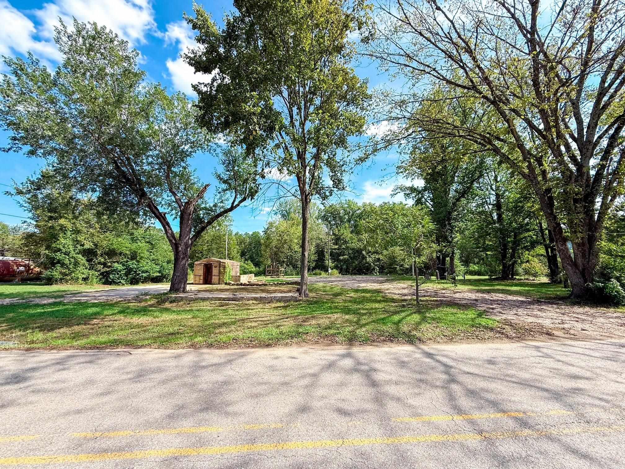 Own a unique piece of history with this 0.47-acre property in historic Scotland, Arkansas! Once home to the townās post office and bank, this land still holds a piece of the pastāthe original bank vault remains on site and could potentially serve as a secure storm shelter. The property is already set up with 3 full RV hookupsāeach offering water, sewer, and electricityāmaking it ready for gatherings, rentals, or your own private getaway. Nestled against a small peaceful creek, the property offers a natural backdrop for relaxation & outdoor enjoyment. Located approx. 5 minutes from the Ozark National Forest, youāll have easy access to some of Arkansasās best hiking, hunting, fishing, and outdoor recreation. Whether youāre looking for a basecamp, a weekend retreat, or a one-of-a-kind investment property with history and character, this land is a rare find in the Ozarks!