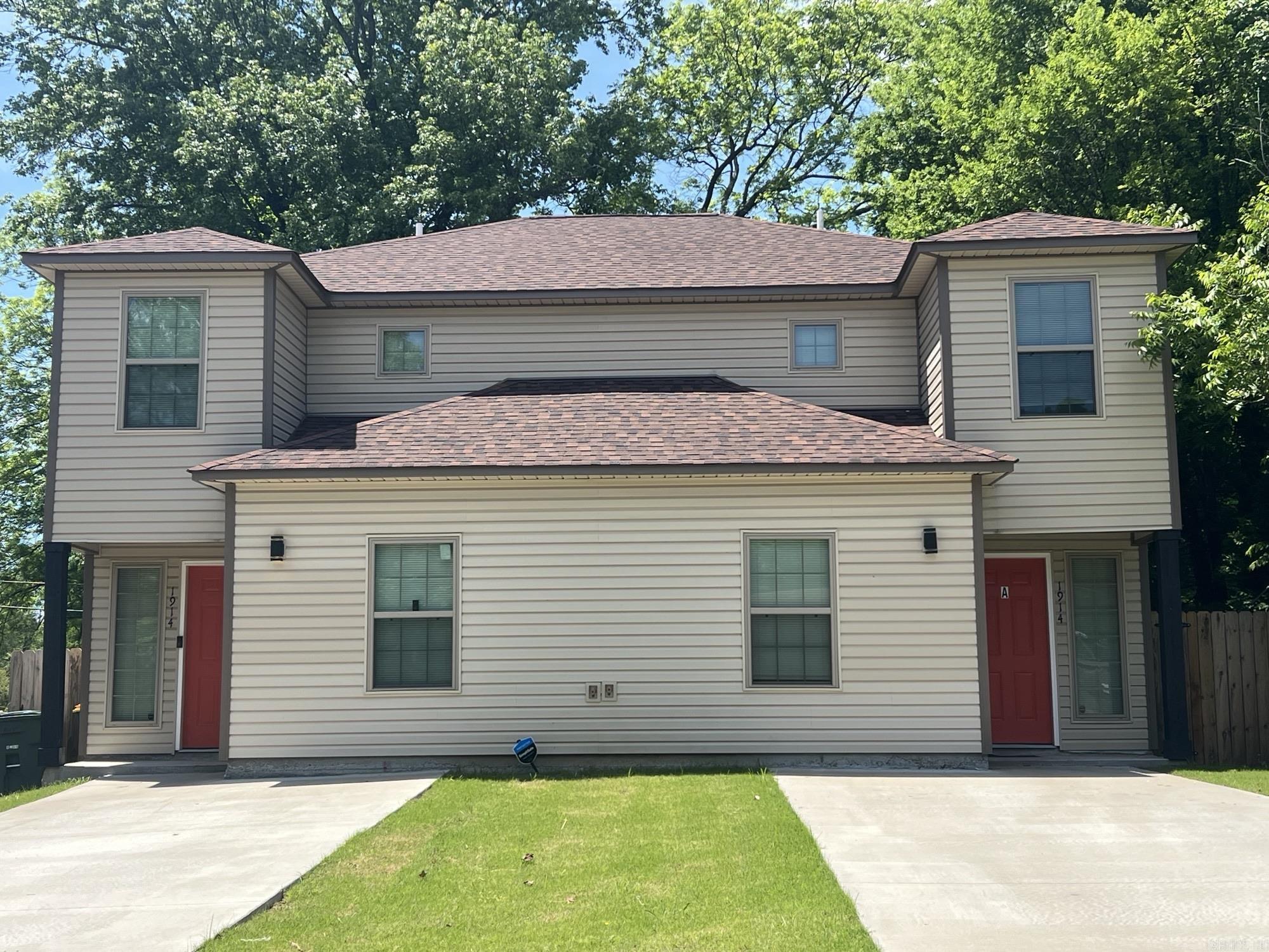 Experience the perfect combination of luxury and comfort in this stunning townhome. Located in the heart of Little Rock, this hidden gem offers two units, each boasting 3 bedrooms and 2 bathrooms, as well as a spacious. With its modern design and amenities, you won't find a more inviting and cozy place to call home.- Please see agent remarks