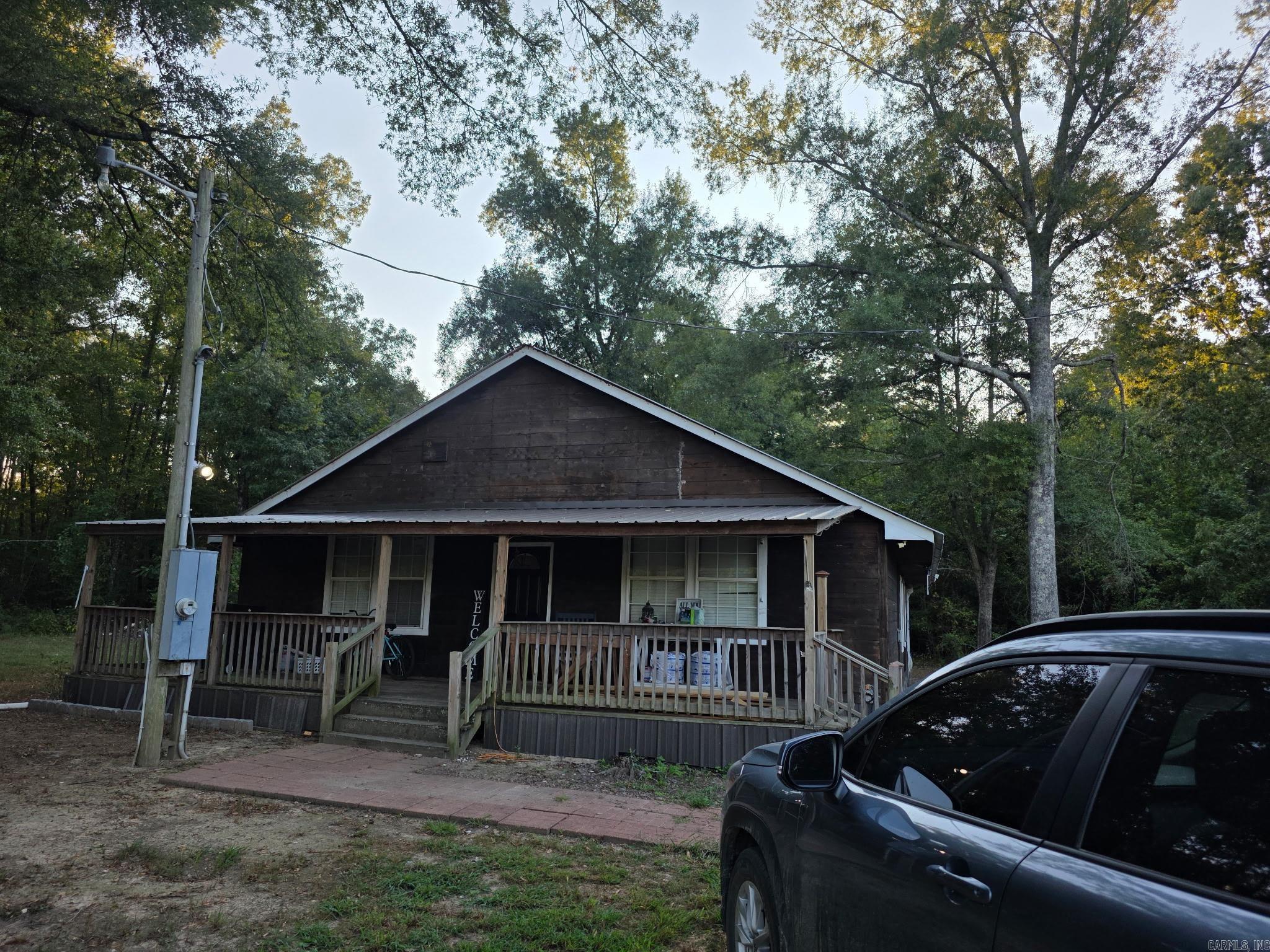 Nice home out of town! This home includes 5 acres with small pond. 3 bed, 1 bath with recent updates. Call or text for showings!