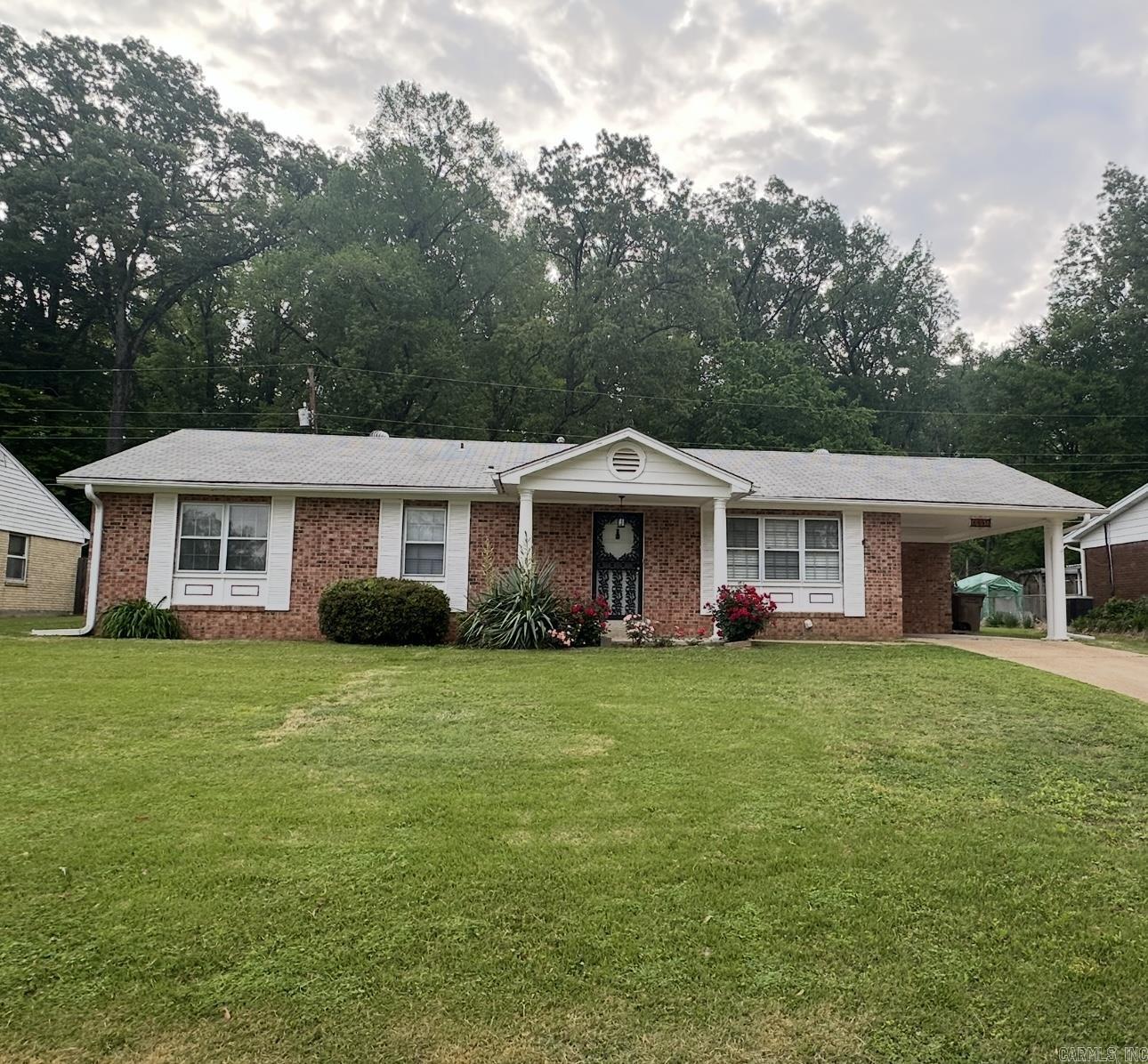 This cozy home has two spacious bedrooms with 2 full bathrooms, nice closets, large formal dining room that could be used for third bedroom. Completely remodeled kitchen with new stainless appliances, full size washer and dryer that will stay with the home. Larger back yard with trees and concrete patio with privacy.