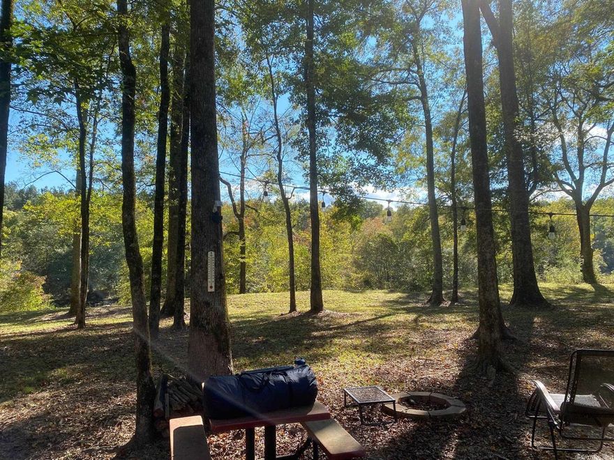 IF YOU WANT TO ESCAPE TO A SOUTHWEST PARADISE...IF you want to discover fly fishing, floating, family fun, boating, and exploring...IF you want to let your spirit soar...this river lot is ready for your forever-home, beckons you to share outdoor adventures, and enjoy Arkansas  beauty.  The lot has utilities, septic, and RV hookup in place. Restrictions apply.