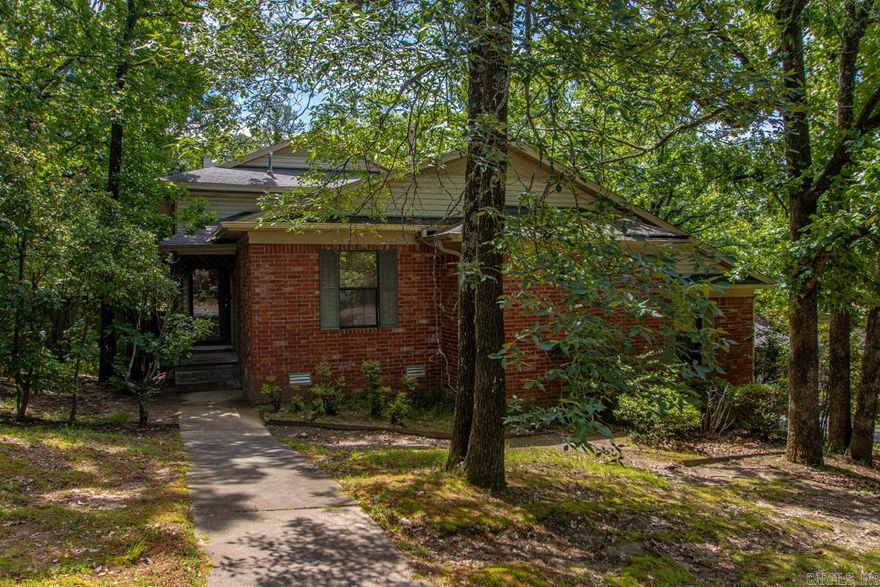 Under $200k in WLR! 3bd 2ba clean home . Alley access with two car covered parking.  Low maintenance exterior & yard. Move in ready or add your personal updates.